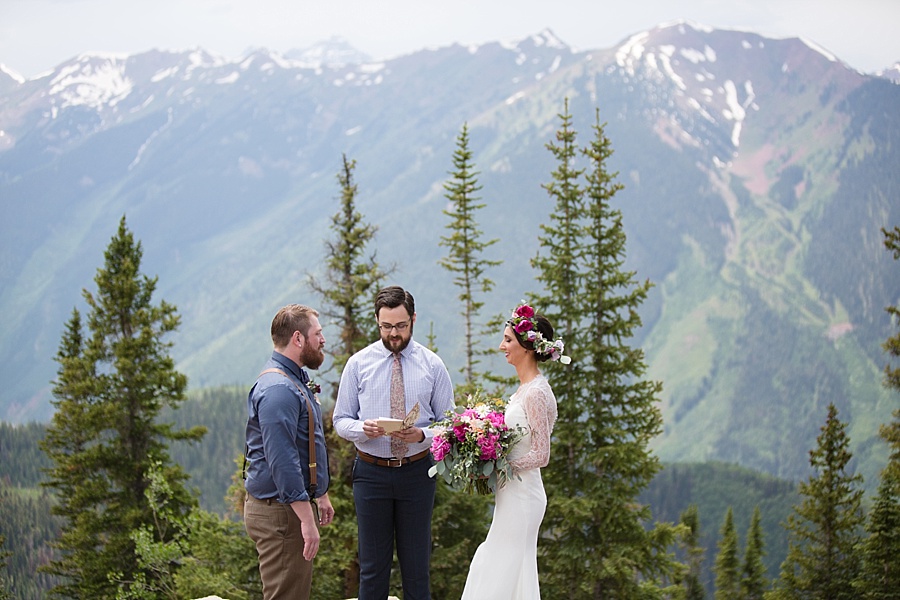 an elopement ceremony at little nell wedding deck in aspen in the summer 