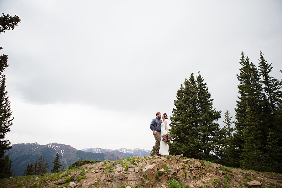 colorado mountain wedding photographer captures couple in the mountains after their aspen elopement 