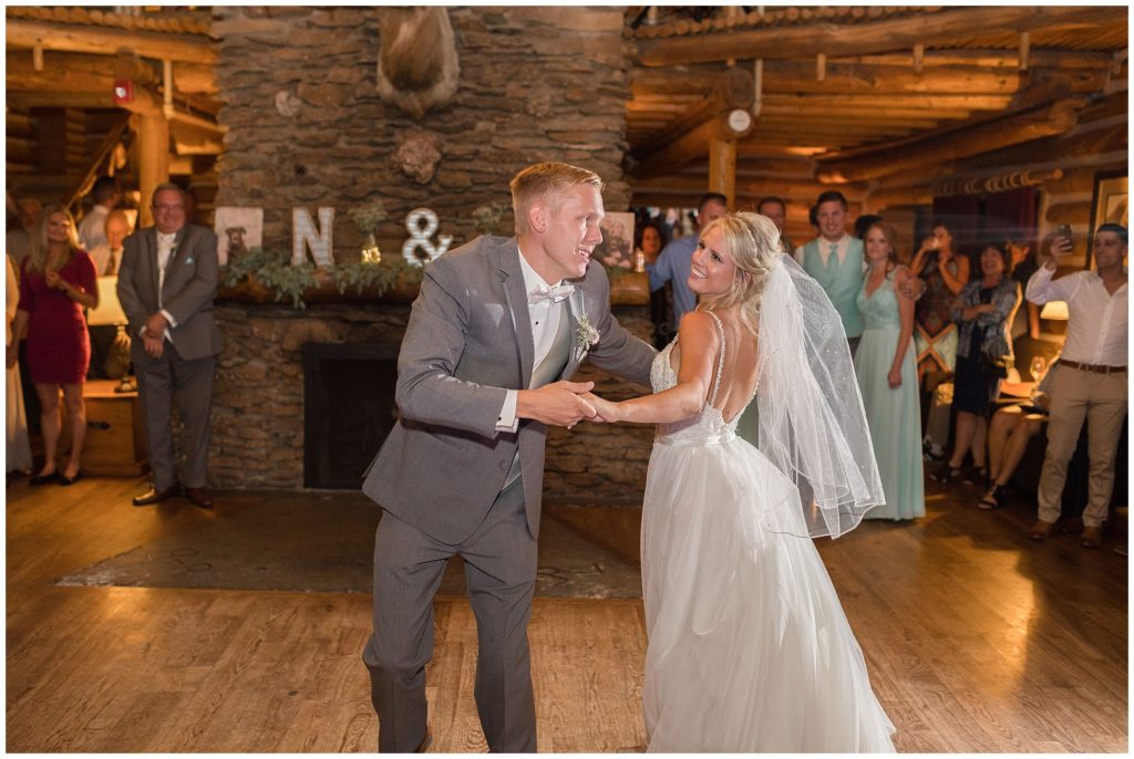 bride and groom dance during their first dance at keystone ranch