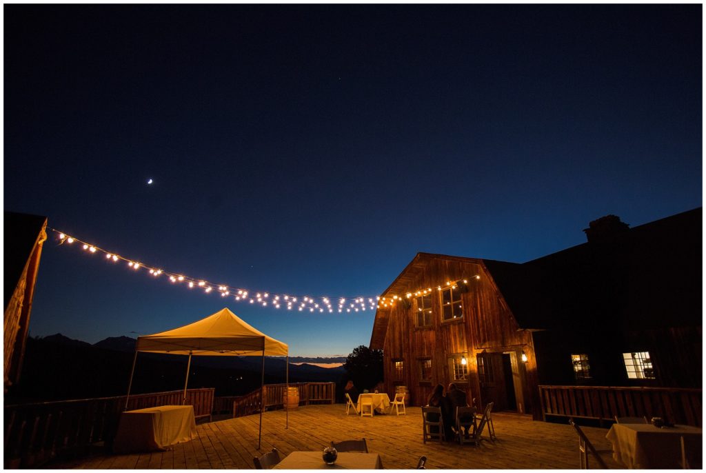 dusk shot of gorrono ranch wedding venue with string lights 