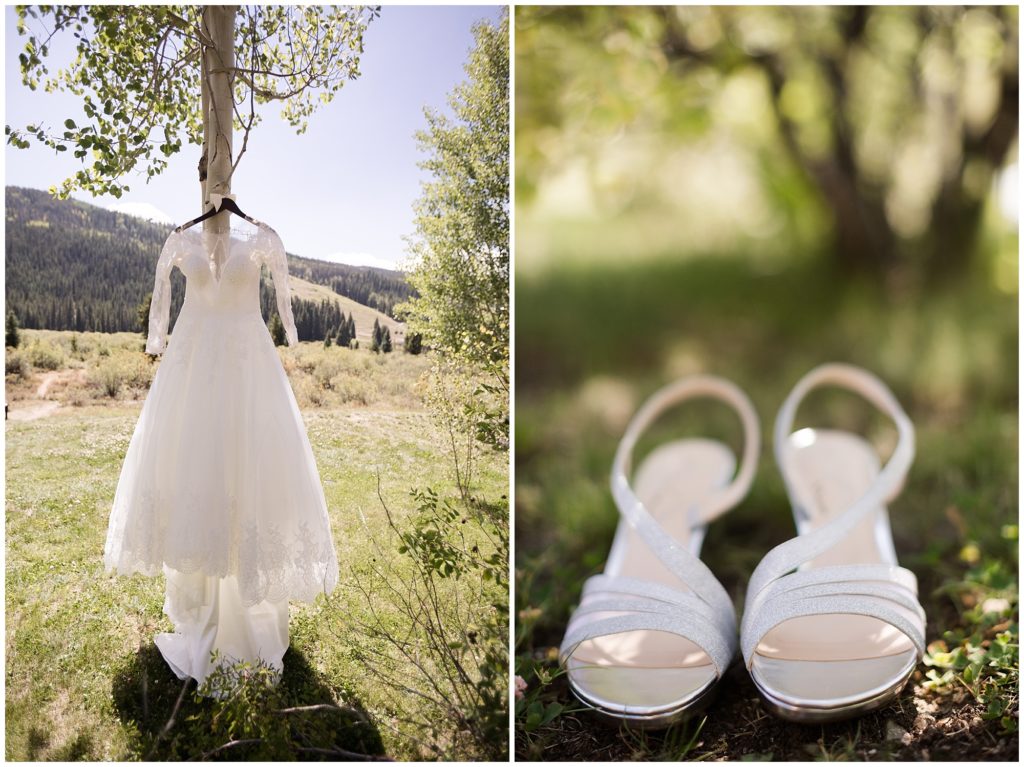 details of long sleeved lace wedding dress and wedding sandals in timber ridge lodge in keystone colorado