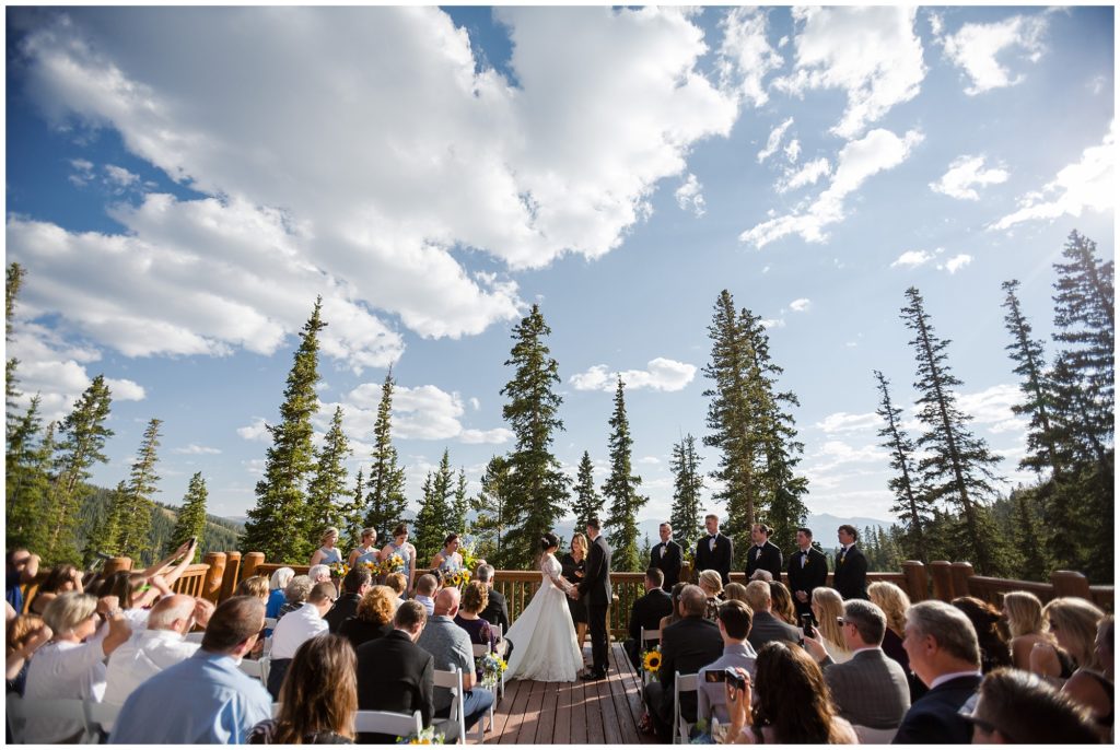 wide shot of wedding ceremony in the summer at timber ridge lodge Colorado 