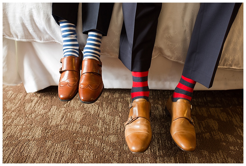 detail of groom and sons shoes and socks on wedding day