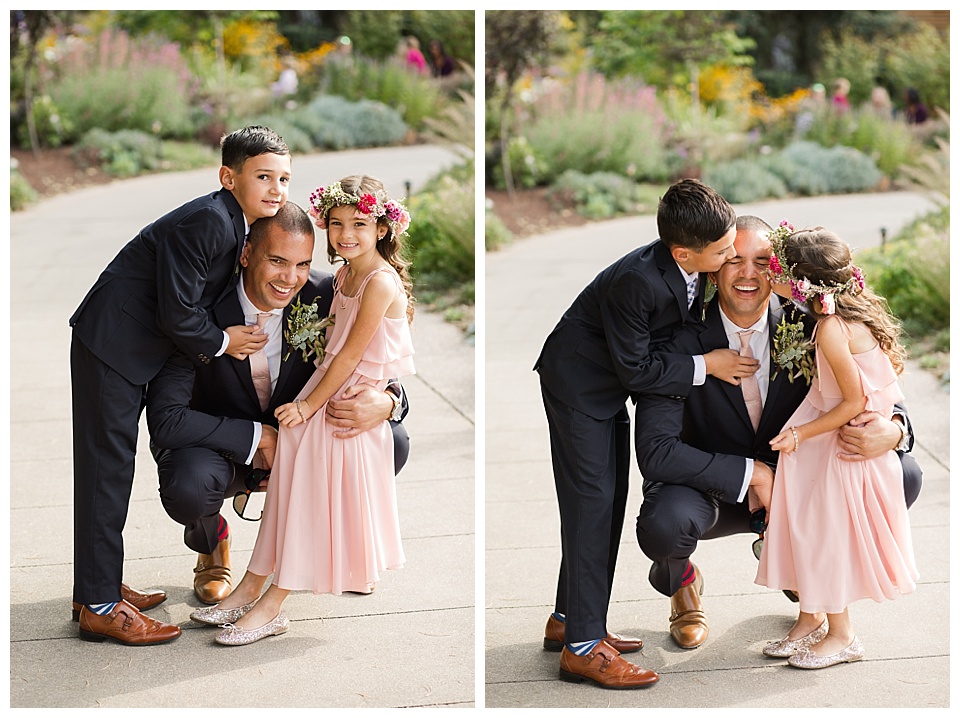 grooms kids hug and kiss him on his wedding day at denver botanic gardens