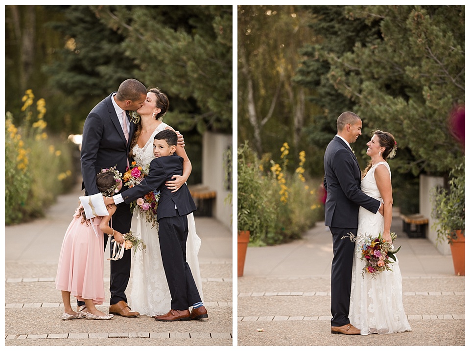 bride and groom and their kids pose after their wedding ceremony at denver botanical gardens 