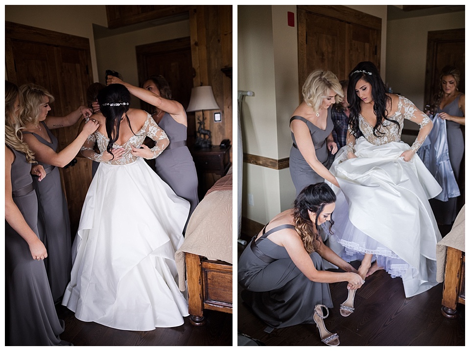 bridesmaids helping bride get into her hayley paige wedding dress