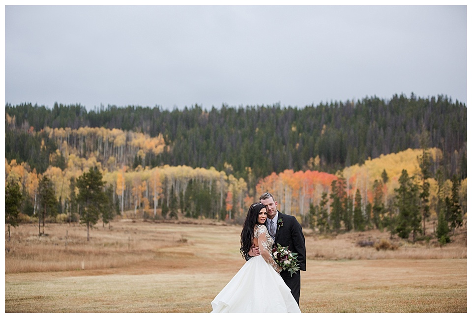 bride turned into groom during wedding portraits at devils thumb ranch