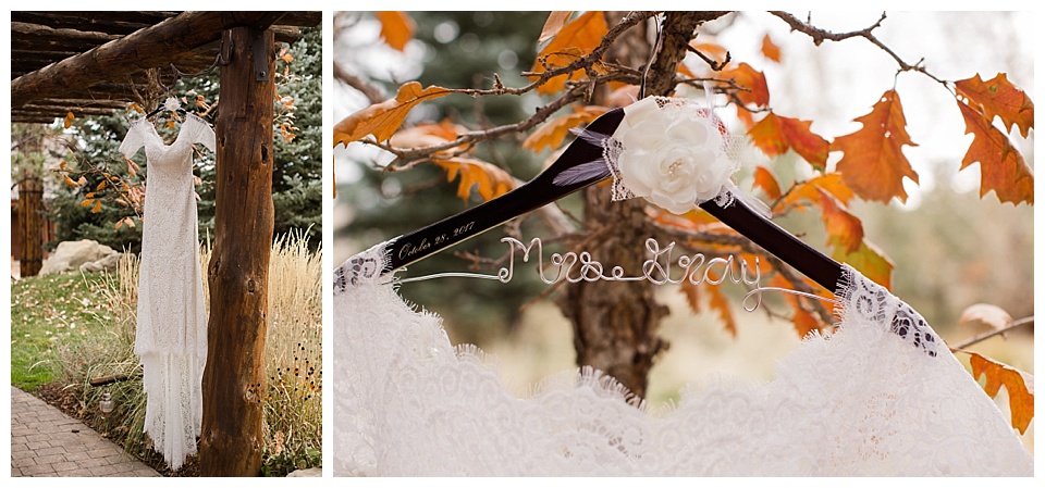 wedding dress hung on personalized hanger with fall leaves