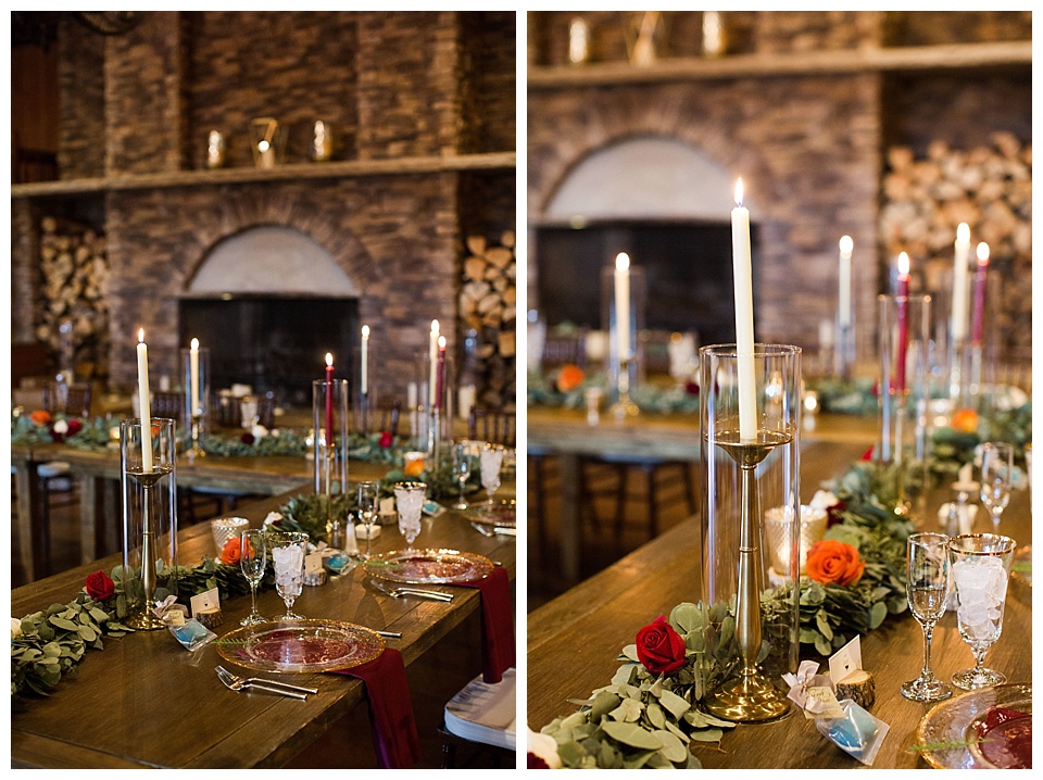 wedding reception table details with tall candles and greenery 