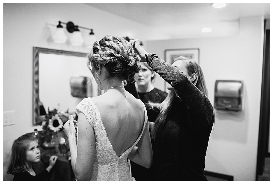 bride getting ready for her elopement