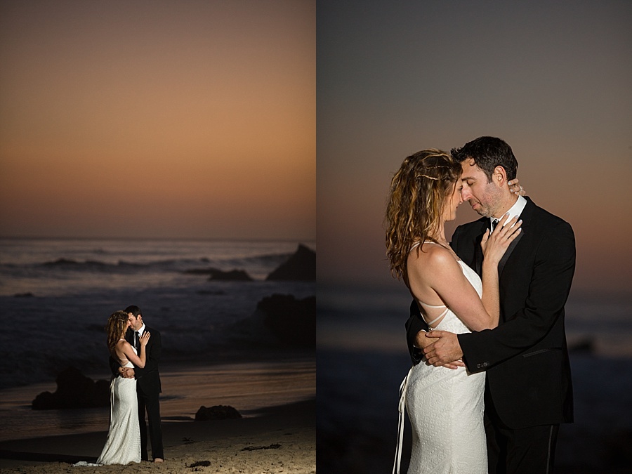 groom and bride hold each other close at matador beach at dusk