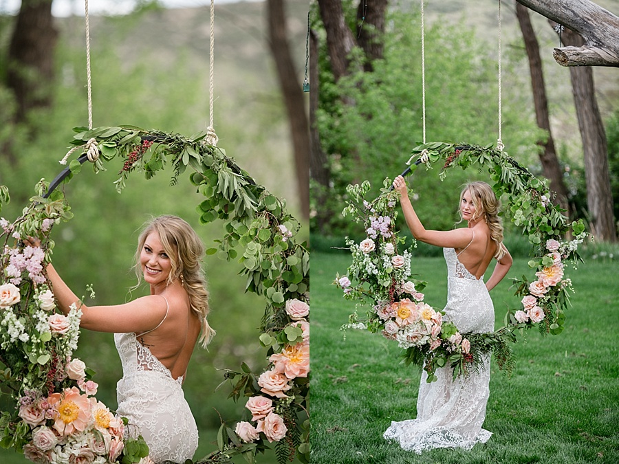 bride poses with pastel floral swing at lyons farmette