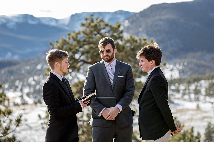 groom says his vows to his groom in breckenridge colorado
