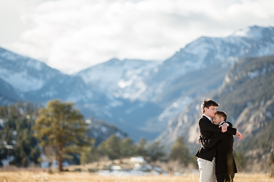 gay couple hugging after their breckenridge elopement