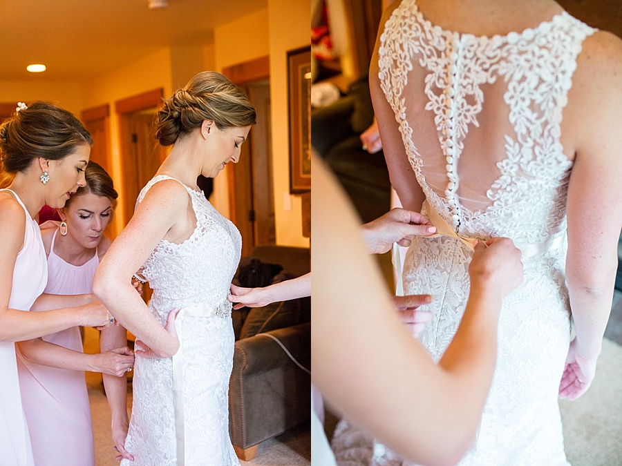 bride puts on her white wedding dress at keystone resort and spa