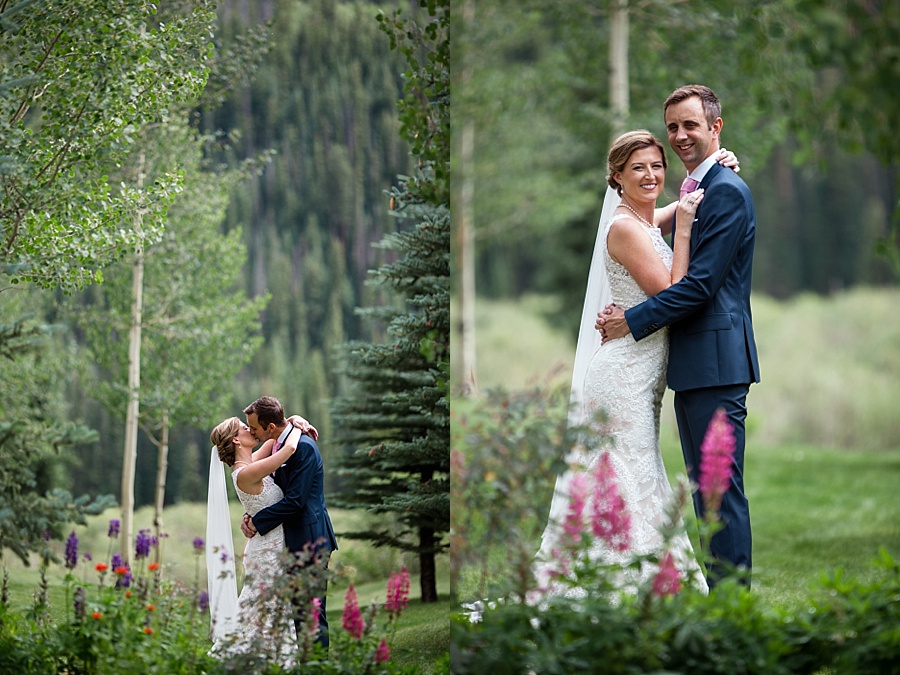 groom dip kissing bride next to summer florals in the mountains in colorado 