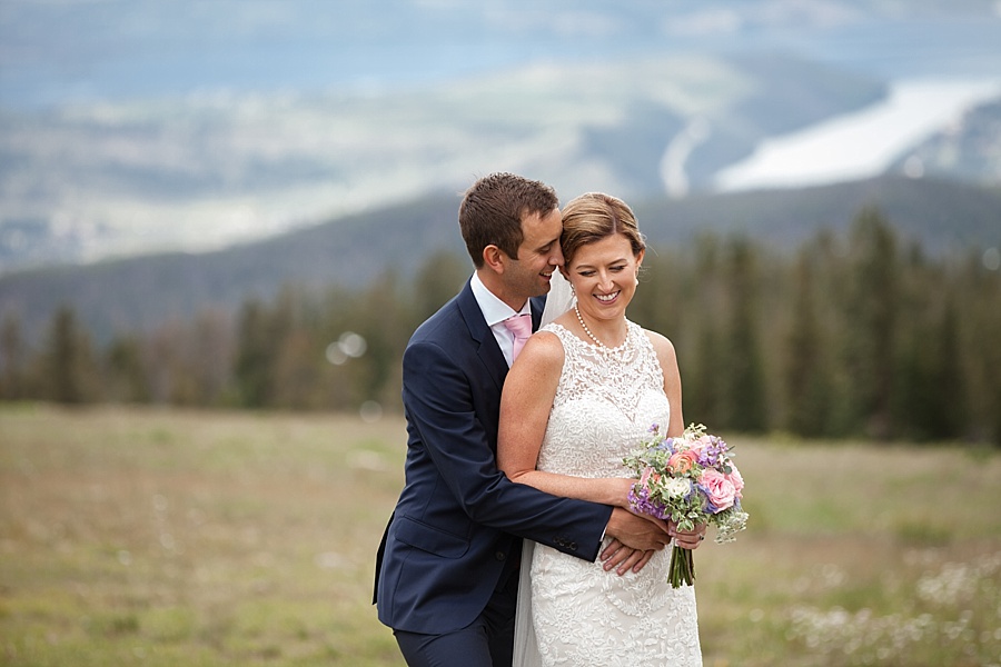 bride and groom candid shots at apenglow stube in keystone colorado 