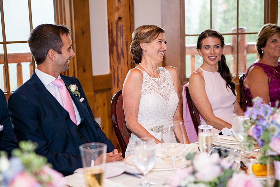 bride laughing during toasts at her keystone wedding reception 