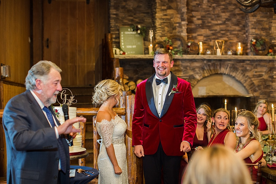 larkspur groom smiling during father in law's speech