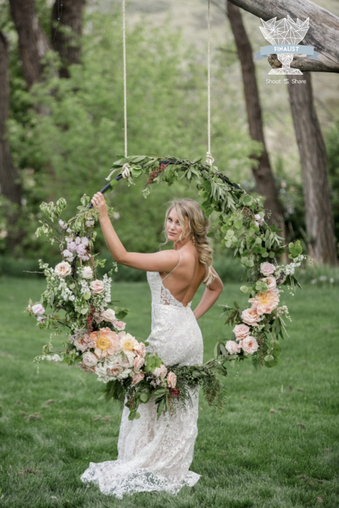 Bride in floral swing