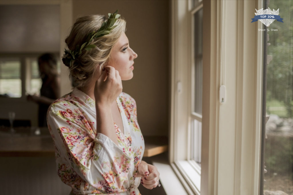 Bride with leaf head crown gets ready at the lower ranch at Spruce mountain ranch