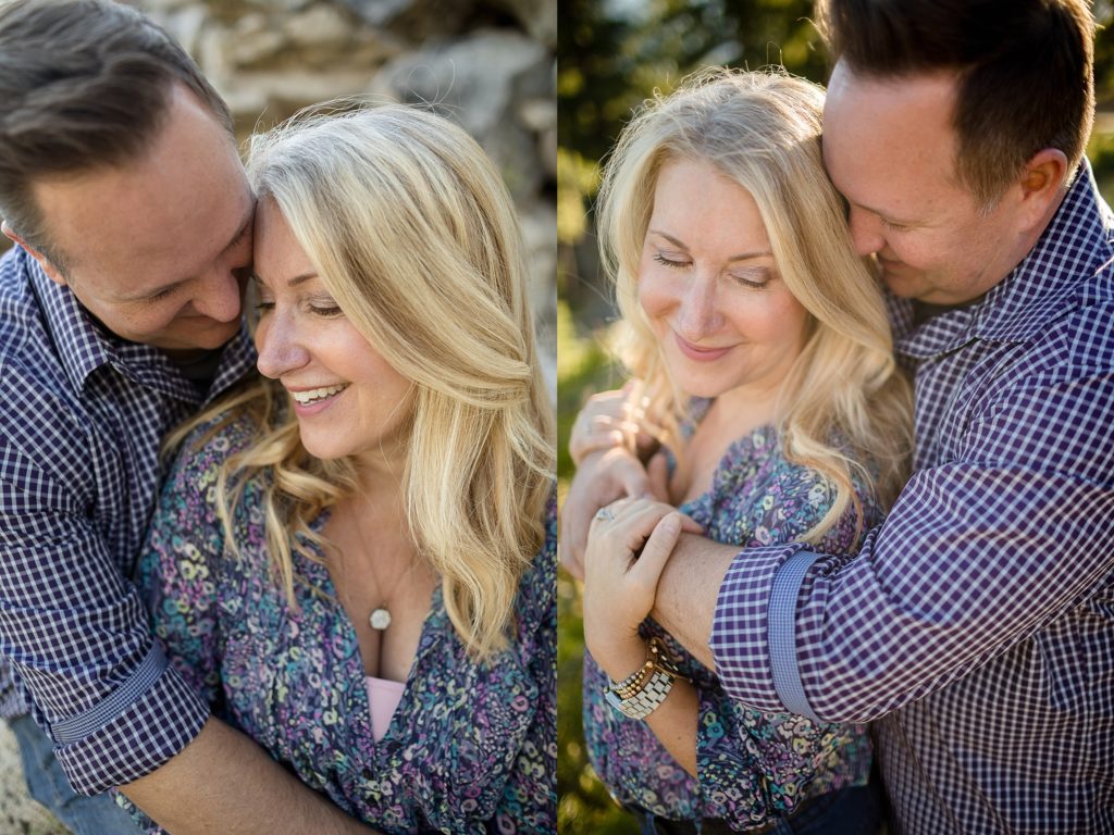 groom hugs bride during engagement session in the mountains