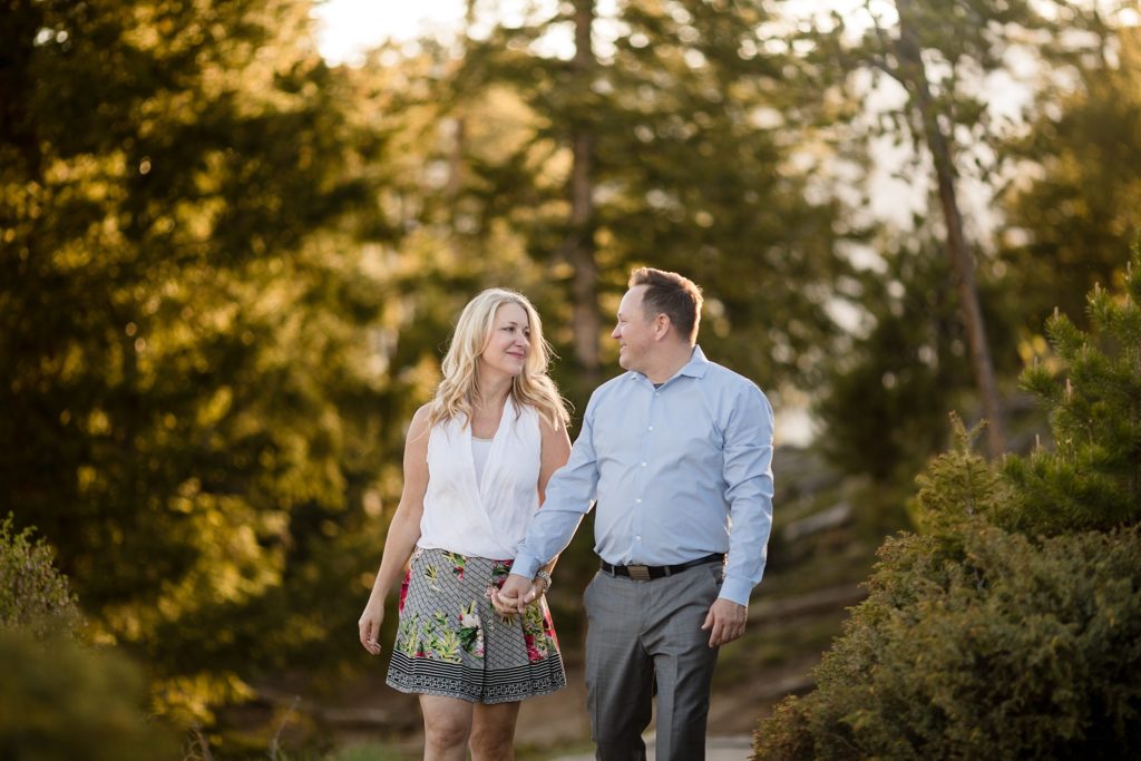 bride and groom to be laughing during engagement session