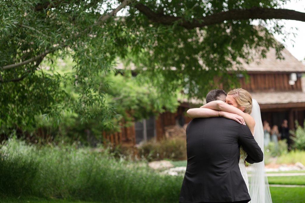 bride and groom first look spruce mountain ranch wedding photographer