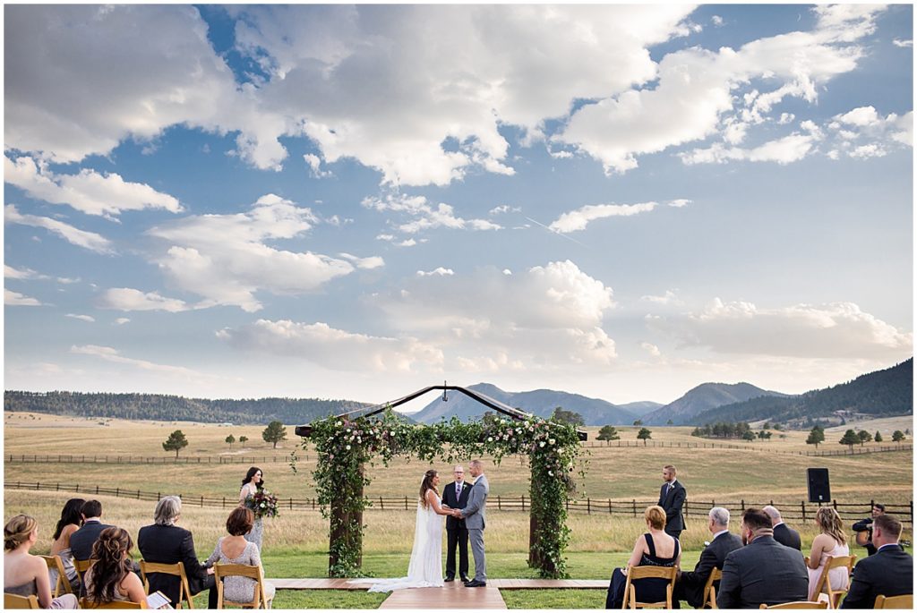 Wedding ceremony with Floral Arch by The Perfect Petal at Spruce Mountain Ranch Autumn