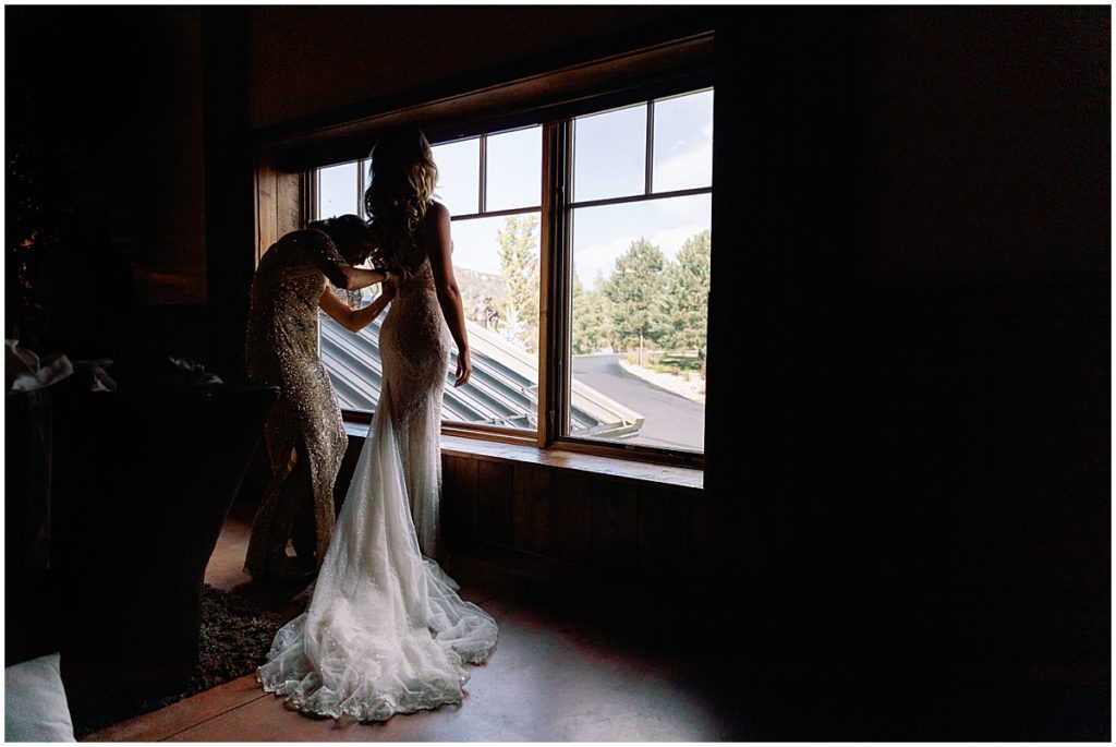 Bride getting ready for wedding at Spruce Mountain Ranch