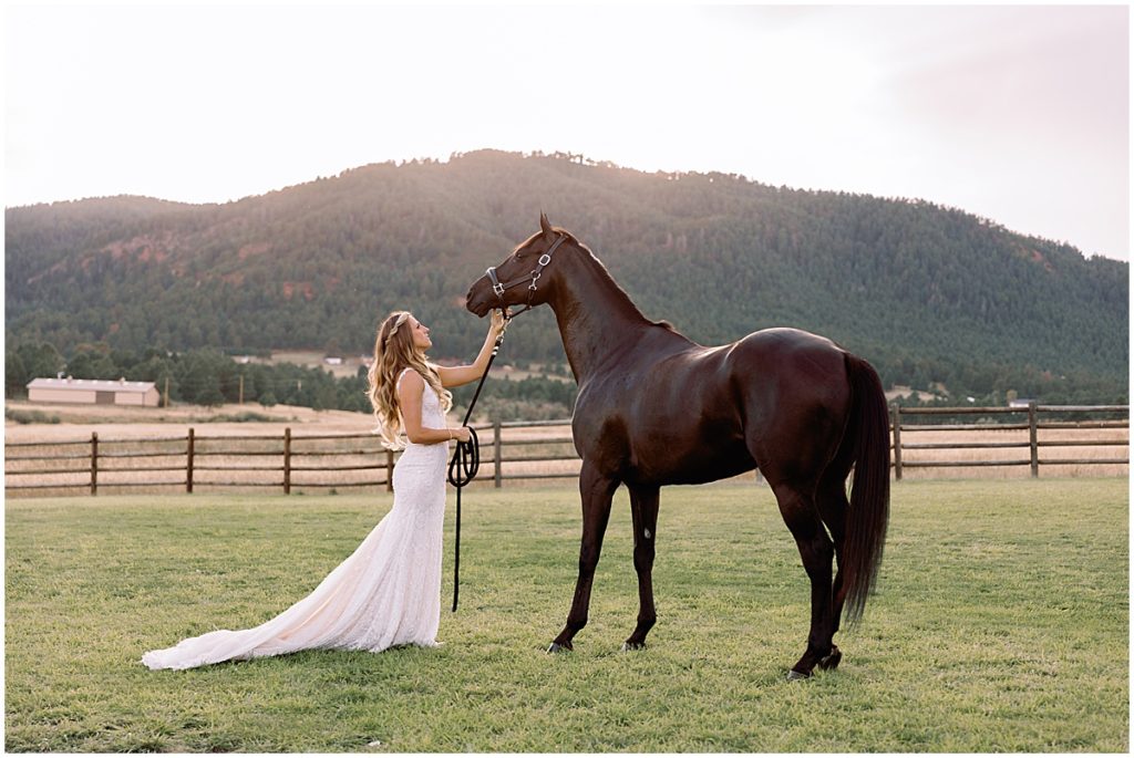 Photograph of Bride at Spruce Mountain Ranch with horse