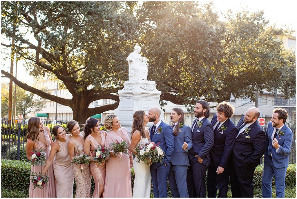 Bridal party outside at The Margaret Place Hotel holding floral designed by The Plant Gallery in New Orleans