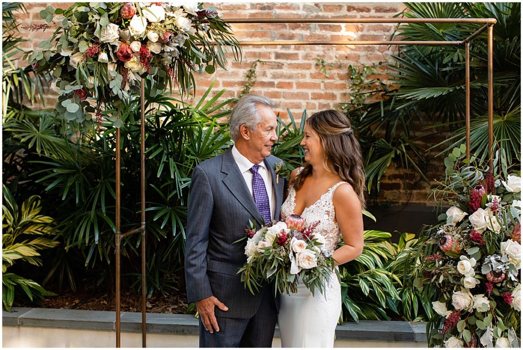 Father and Bride under arch with floral by The Plant Gallery at Margaret Place in New Orleans