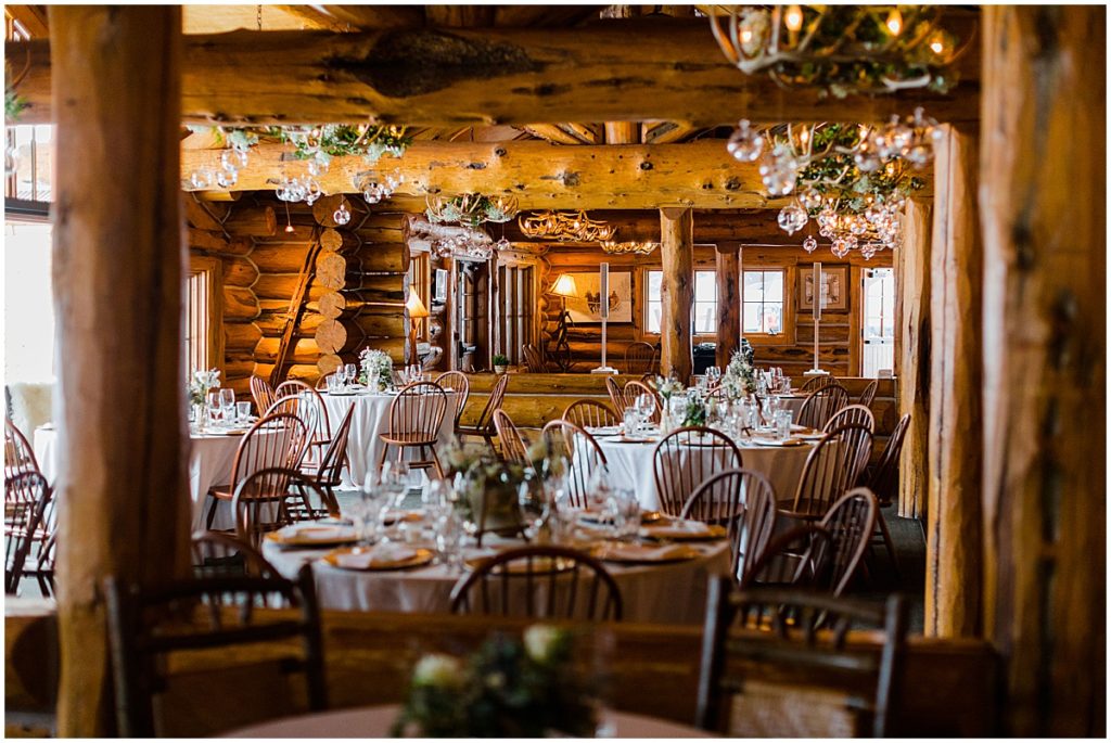 Reception dinner tables at The Pine Creek Cookhouse in Aspen for winter wedding.