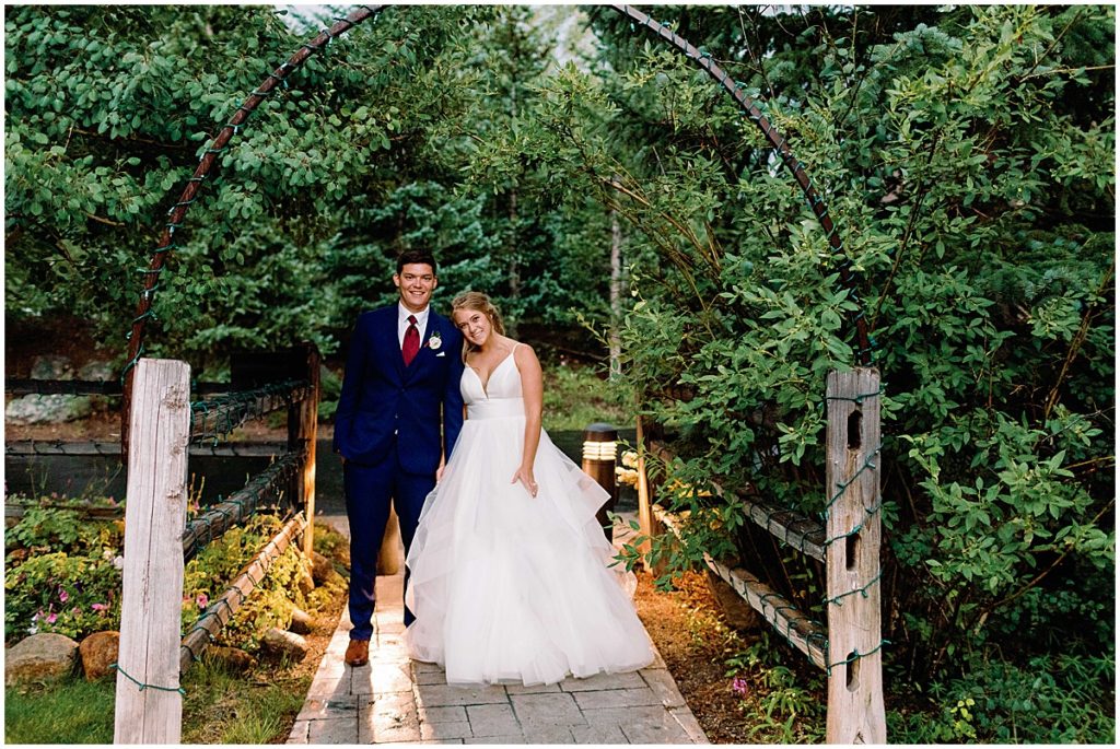 Bride and groom outside at Ski Tip Lodge