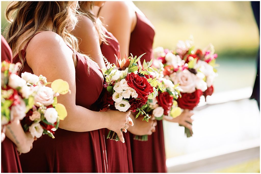 Bridesmaids hold flowers made by Pots & Petals Floral Design