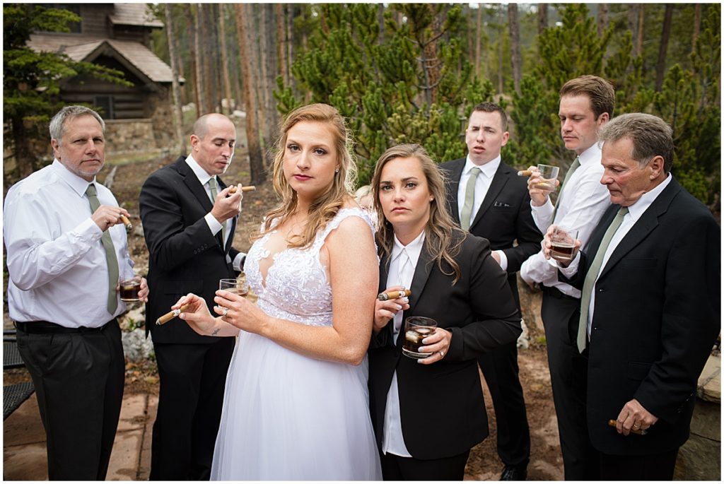 Bridal party cigars before elopement ceremony at Sapphire Point Breckenridge.