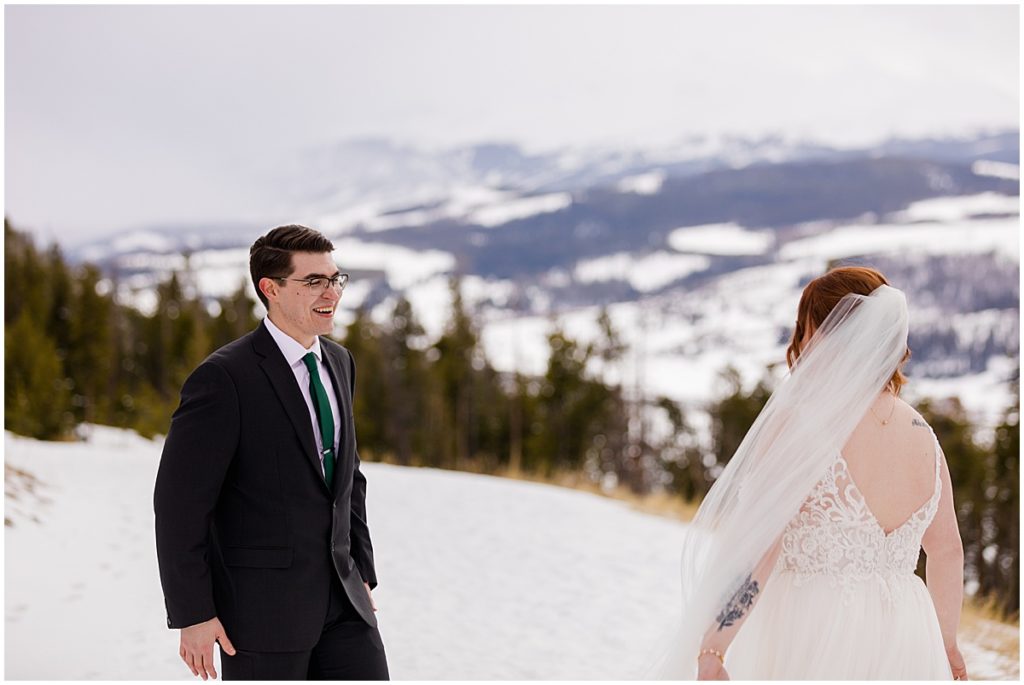 Bride and groom at Sapphire Point in Breckenridge for a micro wedding.  Bride is wearing a dress from Champagne and Lace Bridal.