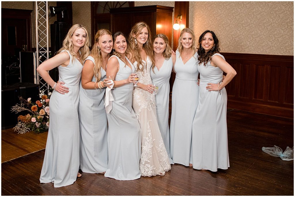 Bride wearing wedding dress from Town and Country Bridal and bridesmaids wearing dress from Amsale. 