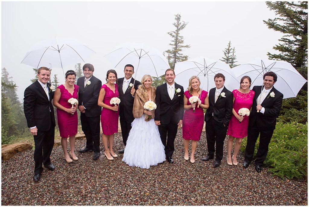 Bridal party at St. Regis hotel in Aspen wedding.  Bride holding bouquet designed by Aspen Branch.
