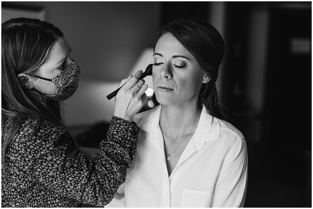 Bride getting makeup done by Couture Colorado at Four Seasons in Vail
