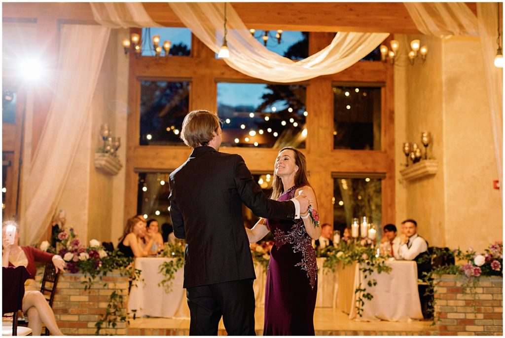 Mother son first dance for Wedding at Della Terra Mountain Chateau in Estes Park.  Groom Wearing suit from Men's Wearhouse