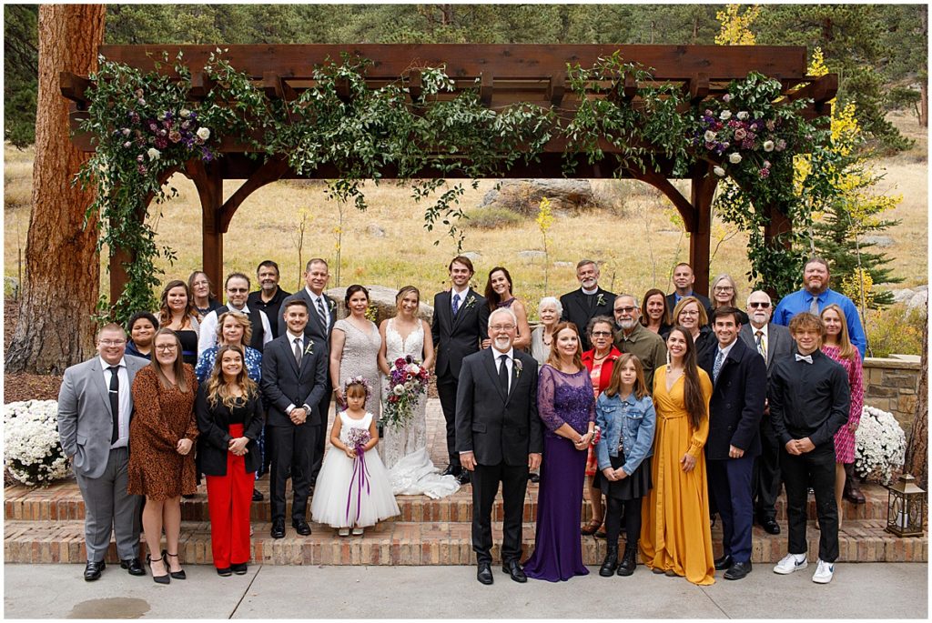 Group photo for wedding at Della Terra Mountain Chateau in Estes Park.