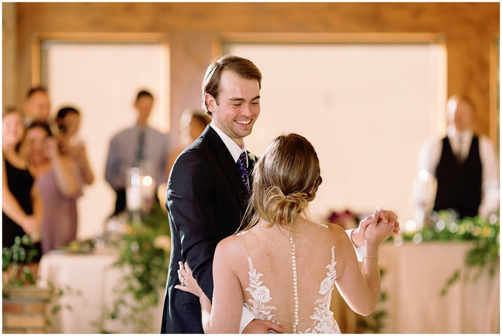 Bride and groom first dance at Della Terra Mountain Chateau in Estes Park.  Bride wearing wedding dress designed by Martina Liana from Volle's Bridal & Boutique.  Groom Wearing suit from Men's Wearhouse. 