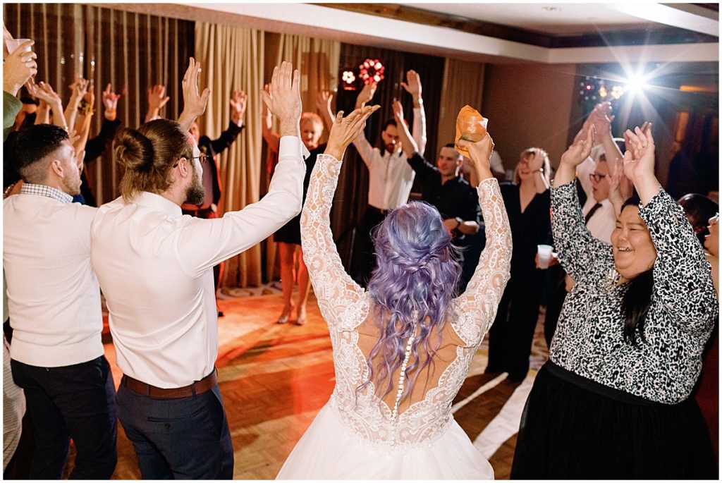 Wedding guests dancing during wedding reception at Ritz Carlton Bachelor Gulch in Beaver Creek.