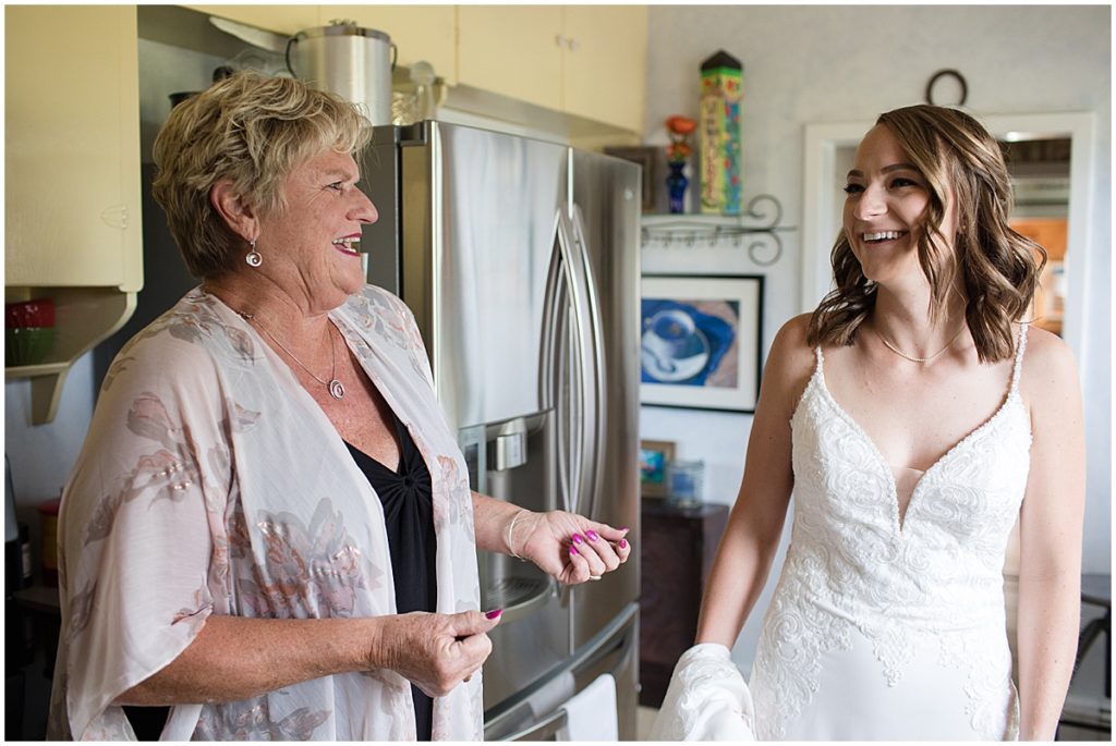 Bride with mom getting ready for elopement 