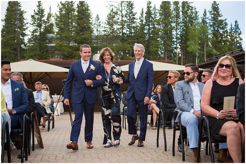 Groom with parents walking down isle for wedding at 10 mile station in Breckenridge