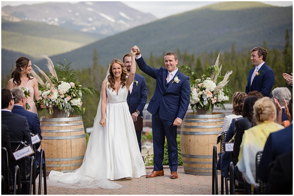 Bride and groom celebrate end of ceremony at 10 mile station in Breckenridge
