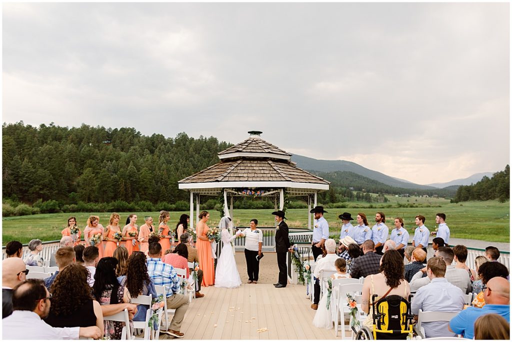 Bride reading vows to groom at Deer Creek Valley Ranch