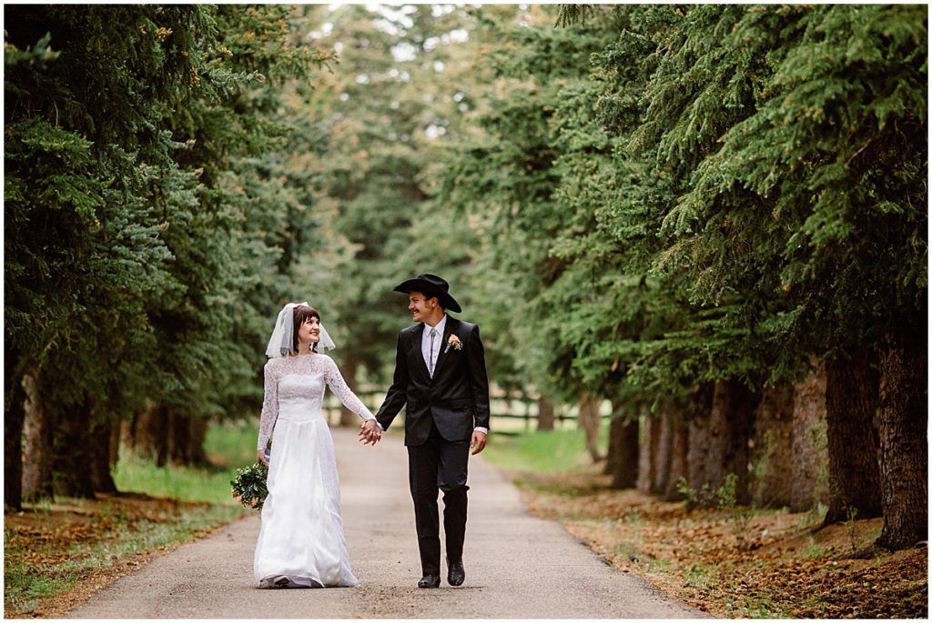 Bride and groom walking outside at Deer Creek Valley Ranch